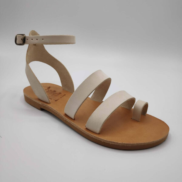 White nubuck leather dressy sandals with two straps, toe ring and high ankle strap, side view single