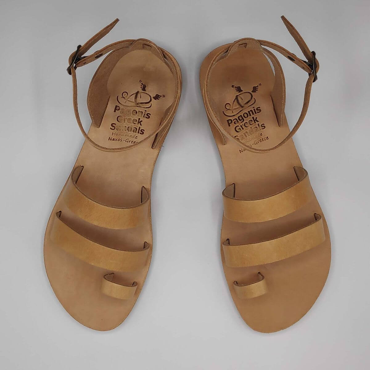 Natural Tan leather dressy sandals with two straps, toe ring and high ankle strap, top view