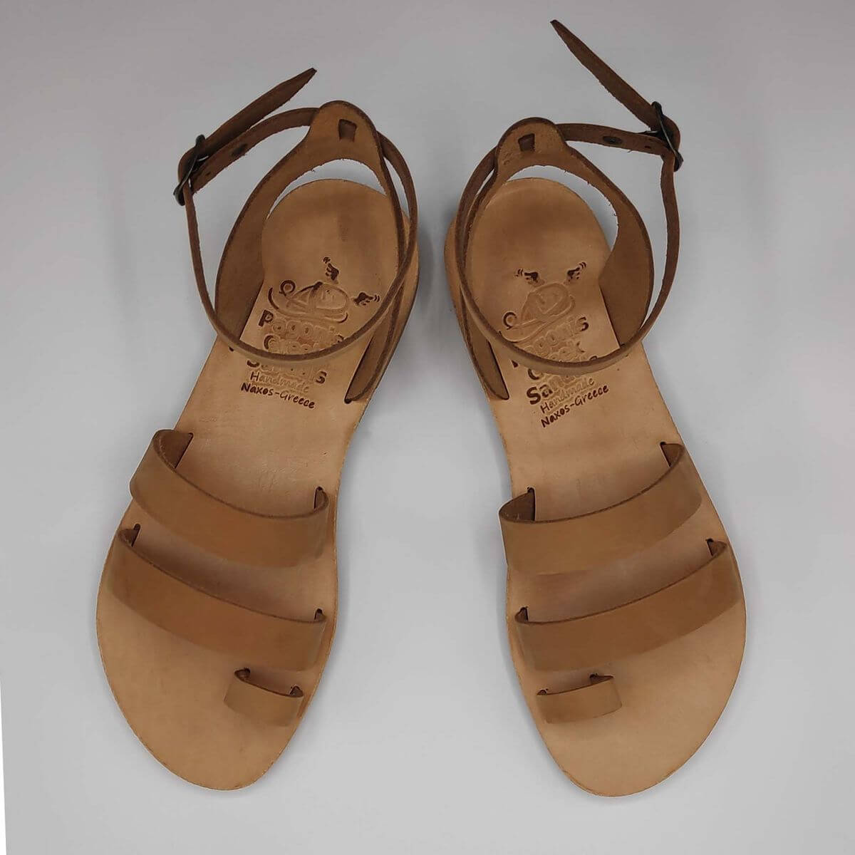 nude nubuck leather dressy sandals with two straps, toe ring and high ankle strap, top view