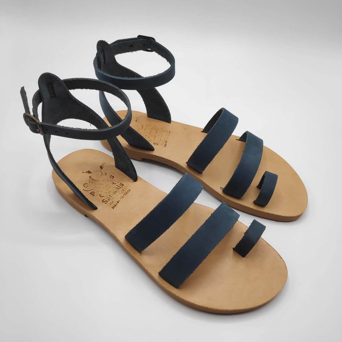 blue nubuck leather dressy sandals with two straps, toe ring and high ankle strap, side view
