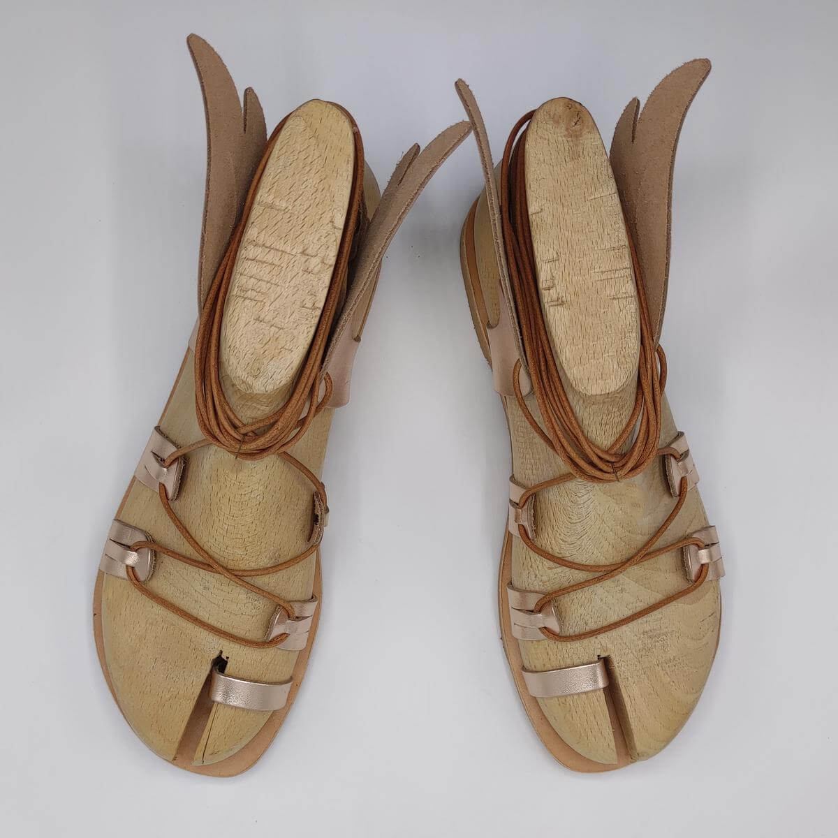 ancient greek sandals with wings rose gold